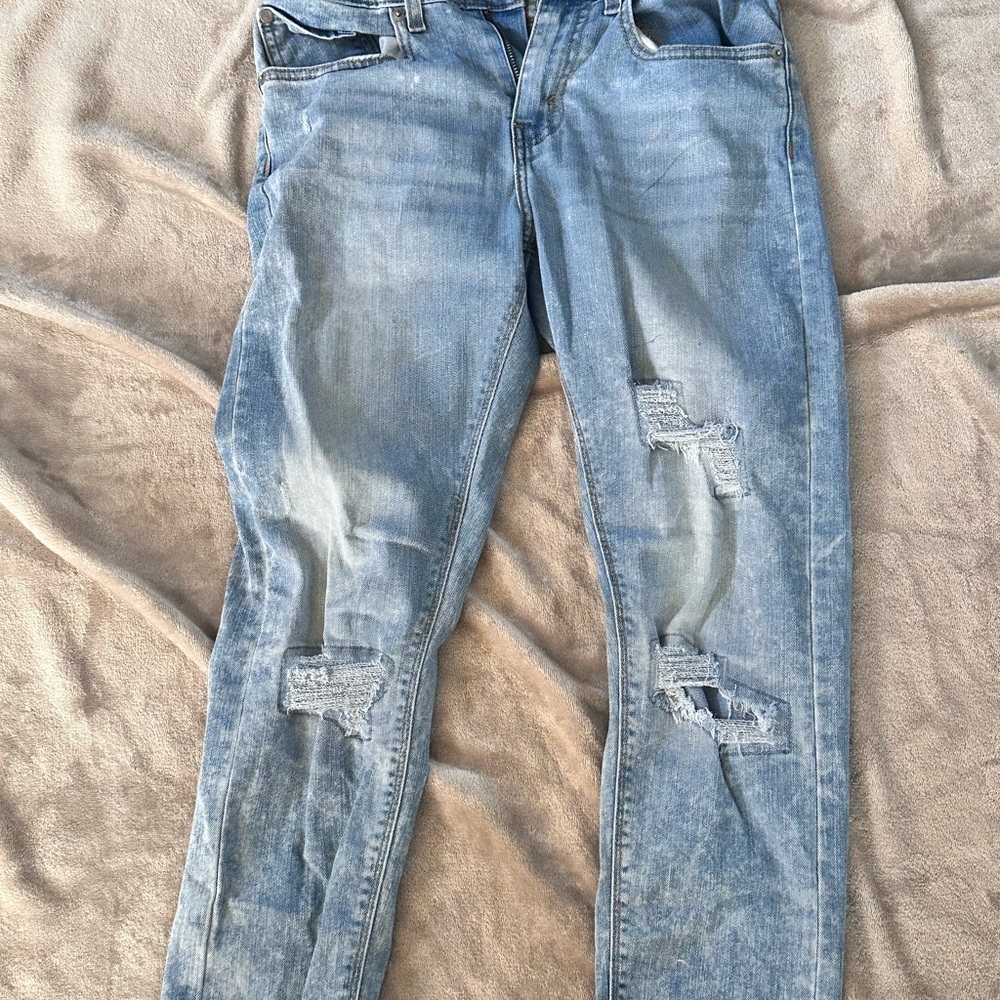 Distressed Light Blue Jeans